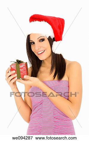 Beautiful Caucasain female holding gifts on white background View Large Photo Image Stock Photo - Beautiful Caucasain female holding gifts on white background. Fotosearch