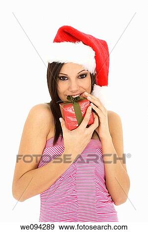Beautiful Caucasain female holding gifts on white background View Large Photo Image Stock Photo - Beautiful Caucasain female holding gifts on white background. Fotosearch