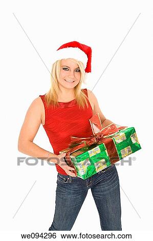 Stock Photograph - Beautiful Caucasain female holding gifts on white background. Fotosearch