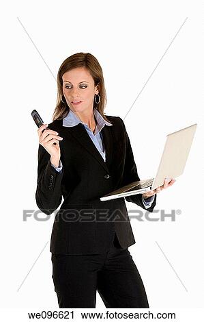 Beautiful Caucasian business holding a laptop computer View Large Photo Image Stock Image - Beautiful Caucasian business holding a laptop computer. Fotosearch
