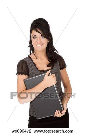 Beautiful Caucasian business woman holding a laptop computer while standing on white background View Large Photo Image Stock Image - Beautiful Caucasian business woman holding a laptop computer while standing on white background. Fotosearch