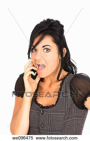 Beautiful Caucasian business woman looking up set while standing on white background View Large Photo Image Stock Photography - Beautiful Caucasian business woman looking up set while standing on white background. Fotosearch