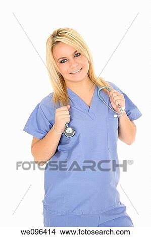 Beautiful Caucasian doctor / nurse standing on white background View Large Photo Image Picture - Beautiful Caucasian doctor / nurse standing on white background. Fotosearch