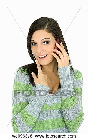 Stock Photo - Beautiful Caucasian female talking on cell phone. Fotosearch