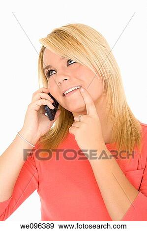 Beautiful Caucasian female talking on cell phone View Large Photo Image Stock Photo - Beautiful Caucasian female talking on cell phone. Fotosearch