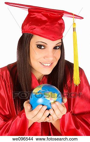Beautiful Caucasian student with he world in the palm of her hand View Large Photo Image Picture - Beautiful Caucasian student with he world in the palm of her hand. Fotosearch