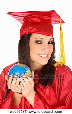 Beautiful Caucasian student with he world in the palm of her hand View Large Photo Image Stock Photo - Beautiful Caucasian student with he world in the palm of her hand. Fotosearch