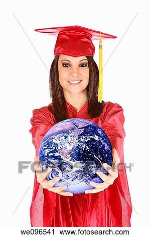 Beautiful Caucasian teenager in a graduation gown holding the world View Large Photo Image Stock Image - Beautiful Caucasian teenager in a graduation gown holding the world. Fotosearch
