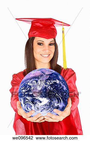 Beautiful Caucasian teenager in a graduation gown holding the world View Large Photo Image Stock Image - Beautiful Caucasian teenager in a graduation gown holding the world. Fotosearch