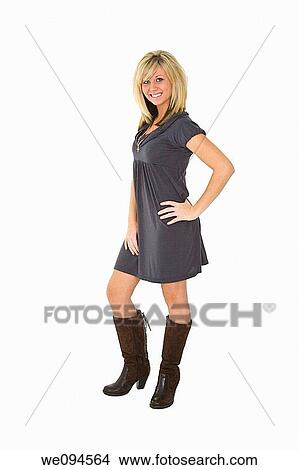 Beautiful caucasian teenager standing on white background smiling with some attitude View Large Photo Image Picture - Beautiful caucasian teenager standing on white background smiling with some attitude. Fotosearch