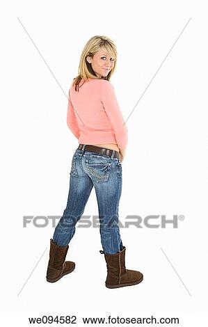 Beautiful caucasian teenager standing on white background smiling with some attitude View Large Photo Image Stock Image - Beautiful caucasian teenager standing on white background smiling with some attitude. Fotosearch