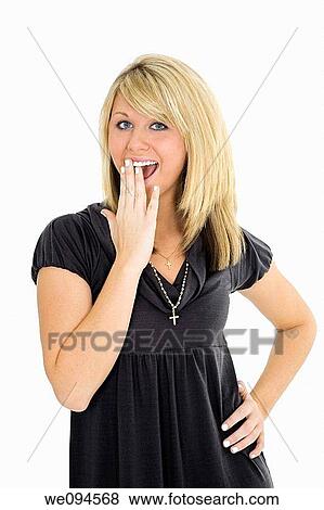 Beautiful caucasian teenager standing on white background smiling with some attitude View Large Photo Image Stock Photo - Beautiful caucasian teenager standing on white background smiling with some attitude. Fotosearch