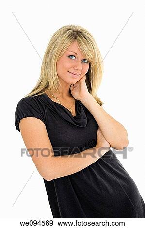 Beautiful caucasian teenager standing on white background smiling with some attitude View Large Photo Image Stock Photo - Beautiful caucasian teenager standing on white background smiling with some attitude. Fotosearch