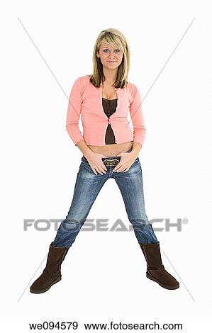 Beautiful caucasian teenager standing on white background smiling with some attitude View Large Photo Image Stock Photo - Beautiful caucasian teenager standing on white background smiling with some attitude. Fotosearch
