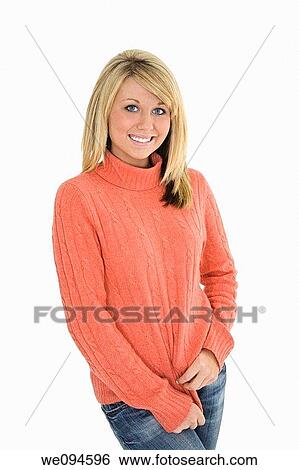 Beautiful caucasian teenager standing on white background smiling with some attitude View Large Photo Image Stock Photograph - Beautiful caucasian teenager standing on white background smiling with some attitude. Fotosearch