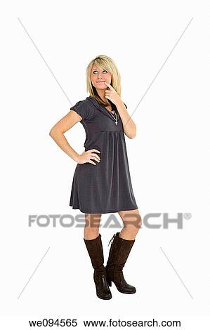Beautiful caucasian teenager standing on white background thinking about something with some attitude View Large Photo Image Stock Photography - Beautiful caucasian teenager standing on white background thinking about something with some attitude. Fotosearch