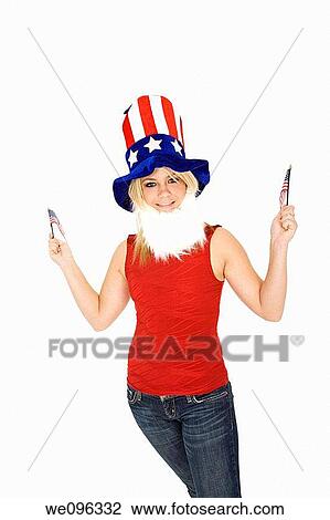 Stock Image - Beautiful Caucasian woman celibrating the 4th of July. Fotosearch