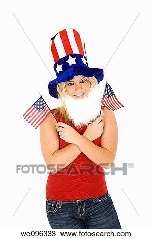Beautiful Caucasian woman celibrating the 4th of July View Large Photo Image Stock Image - Beautiful Caucasian woman celibrating the 4th of July. Fotosearch