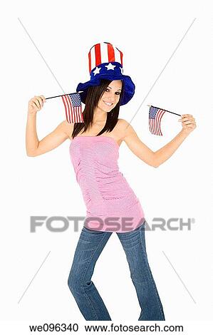 Beautiful Caucasian woman celibrating the 4th of July View Large Photo Image Stock Image - Beautiful Caucasian woman celibrating the 4th of July. Fotosearch