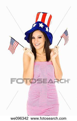 Beautiful Caucasian woman celibrating the 4th of July View Large Photo Image Stock Image - Beautiful Caucasian woman celibrating the 4th of July. Fotosearch