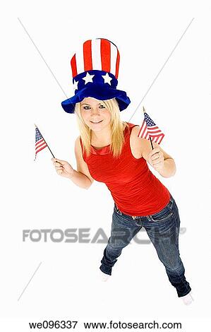Beautiful Caucasian woman celibrating the 4th of July View Large Photo Image Stock Photo - Beautiful Caucasian woman celibrating the 4th of July. Fotosearch