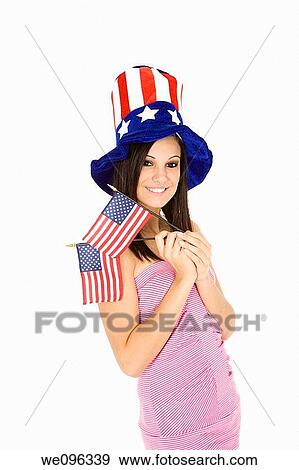 Beautiful Caucasian woman celibrating the 4th of July View Large Photo Image Stock Photo - Beautiful Caucasian woman celibrating the 4th of July. Fotosearch