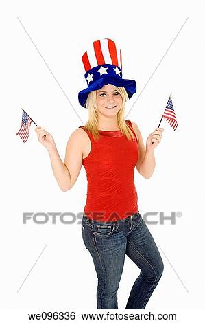 Beautiful Caucasian woman celibrating the 4th of July View Large Photo Image Stock Photograph - Beautiful Caucasian woman celibrating the 4th of July. Fotosearch