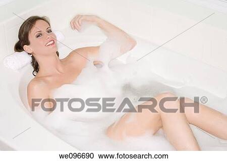 Beautiful Caucasian woman enjoying a nice bubble bath View Large Photo Image Stock Image - Beautiful Caucasian woman enjoying a nice bubble bath. Fotosearch