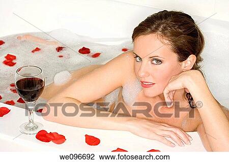 Beautiful Caucasian woman enjoying a nice bubble bath View Large Photo Image Stock Image - Beautiful Caucasian woman enjoying a nice bubble bath. Fotosearch