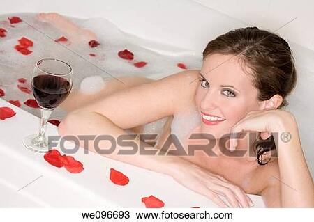 Beautiful Caucasian woman enjoying a nice bubble bath View Large Photo Image Stock Image - Beautiful Caucasian woman enjoying a nice bubble bath. Fotosearch