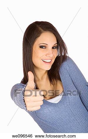 Beautiful Caucasian woman giving the thumbs up on a white background View Large Photo Image Stock Photograph - Beautiful Caucasian woman giving the thumbs up on a white background. Fotosearch