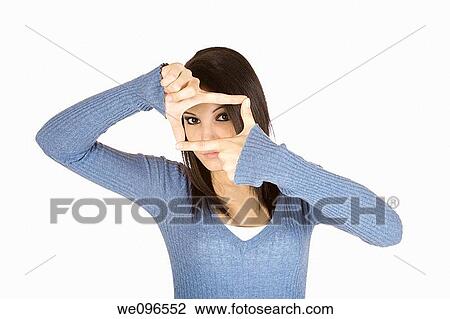 Beautiful Caucasian woman gresturing with her hands on a white background View Large Photo Image Stock Image - Beautiful Caucasian woman gresturing with her hands on a white background. Fotosearch