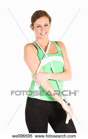 Beautiful Caucasian woman holding a jump rope in fitness clothes View Large Photo Image Stock Photography - Beautiful Caucasian woman holding a jump rope in fitness clothes. Fotosearch