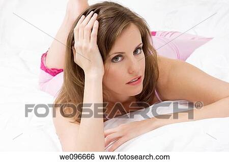 Beautiful Caucasian woman in bed View Large Photo Image Stock Photograph - Beautiful Caucasian woman in bed. Fotosearch