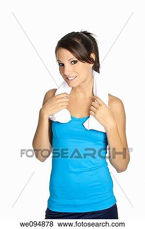 Beautiful Caucasian woman in fitness outfit with towel draped around neck View Large Photo Image Stock Photo - Beautiful Caucasian woman in fitness outfit with towel draped around neck. Fotosearch