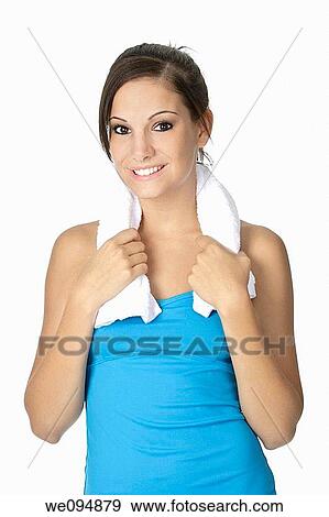 Beautiful Caucasian woman in fitness outfit with towel draped around neck View Large Photo Image Stock Photo - Beautiful Caucasian woman in fitness outfit with towel draped around neck. Fotosearch
