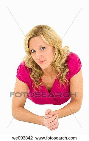 Beautiful caucasian woman laying on a white background together in casual clothing View Large Photo Image Stock Image - Beautiful caucasian woman laying on a white background together in casual clothing. Fotosearch