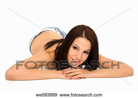 Beautiful caucasian woman laying on a white background wearing casaul clothing and smiling View Large Photo Image Stock Photo - Beautiful caucasian woman laying on a white background wearing casaul clothing and smiling. Fotosearch