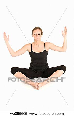 Beautiful Caucasian woman practicing Yoda on a white background View Large Photo Image Stock Photograph - Beautiful Caucasian woman practicing Yoda on a white background. Fotosearch