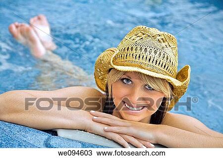 Beautiful caucasian woman relaxing in a hottub View Large Photo Image Stock Image - Beautiful caucasian woman relaxing in a hottub. Fotosearch