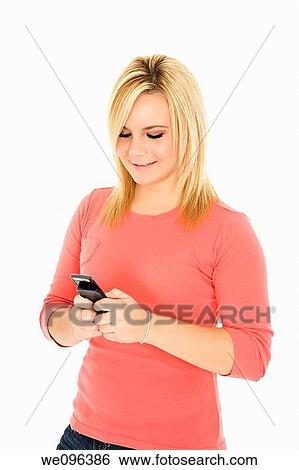 Beautiful Caucasian woman text messaging on white background View Large Photo Image Stock Photograph - Beautiful Caucasian woman text messaging on white background. Fotosearch