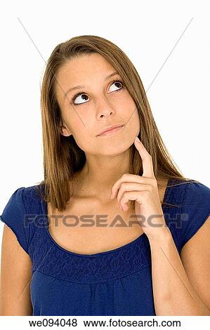Beautiful caucasian woman thinking with her finger upto her head View Large Photo Image Stock Photo - Beautiful caucasian woman thinking with her finger upto her head. Fotosearch