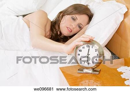 Beautiful Caucasian woman waking up in the morning View Large Photo Image Stock Image - Beautiful Caucasian woman waking up in the morning. Fotosearch