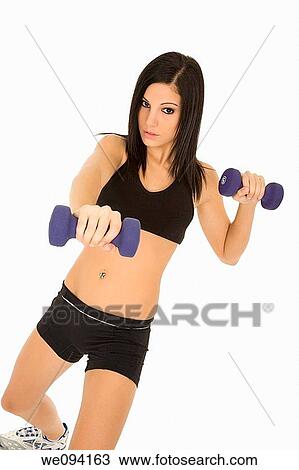 Beautiful Caucasian woman working out with dumbbells on white background View Large Photo Image Stock Image - Beautiful Caucasian woman working out with dumbbells on white background. Fotosearch