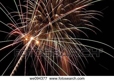 Beautiful fireworks fill the night time sky View Large Photo Image Stock Photo - Beautiful fireworks fill the night time sky. Fotosearch