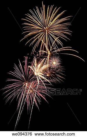 Beautiful fireworks fill the night time sky View Large Photo Image Stock Photograph - Beautiful fireworks fill the night time sky. Fotosearch