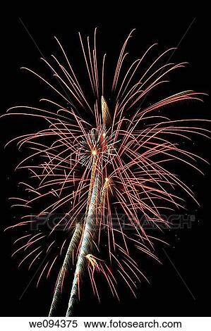 Beautiful fireworks fill the night time sky View Large Photo Image Stock Photography - Beautiful fireworks fill the night time sky. Fotosearch