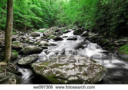 Beautiful waterfall in Great Smoky Mountains National Park, on the border of North Carolina and Tennessee View Large Photo Image Stock Photograph - Beautiful waterfall in Great Smoky Mountains National Park, on the border of North Carolina and Tennessee. Fotosearch
