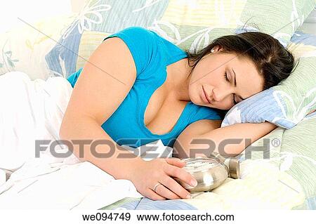 Beautiful woman oversleeping in the morning View Large Photo Image Stock Photo - Beautiful woman oversleeping in the morning. Fotosearch