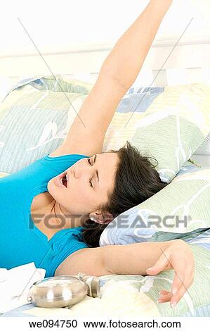 Beautiful woman waking up in the morning View Large Photo Image Stock Image - Beautiful woman waking up in the morning. Fotosearch